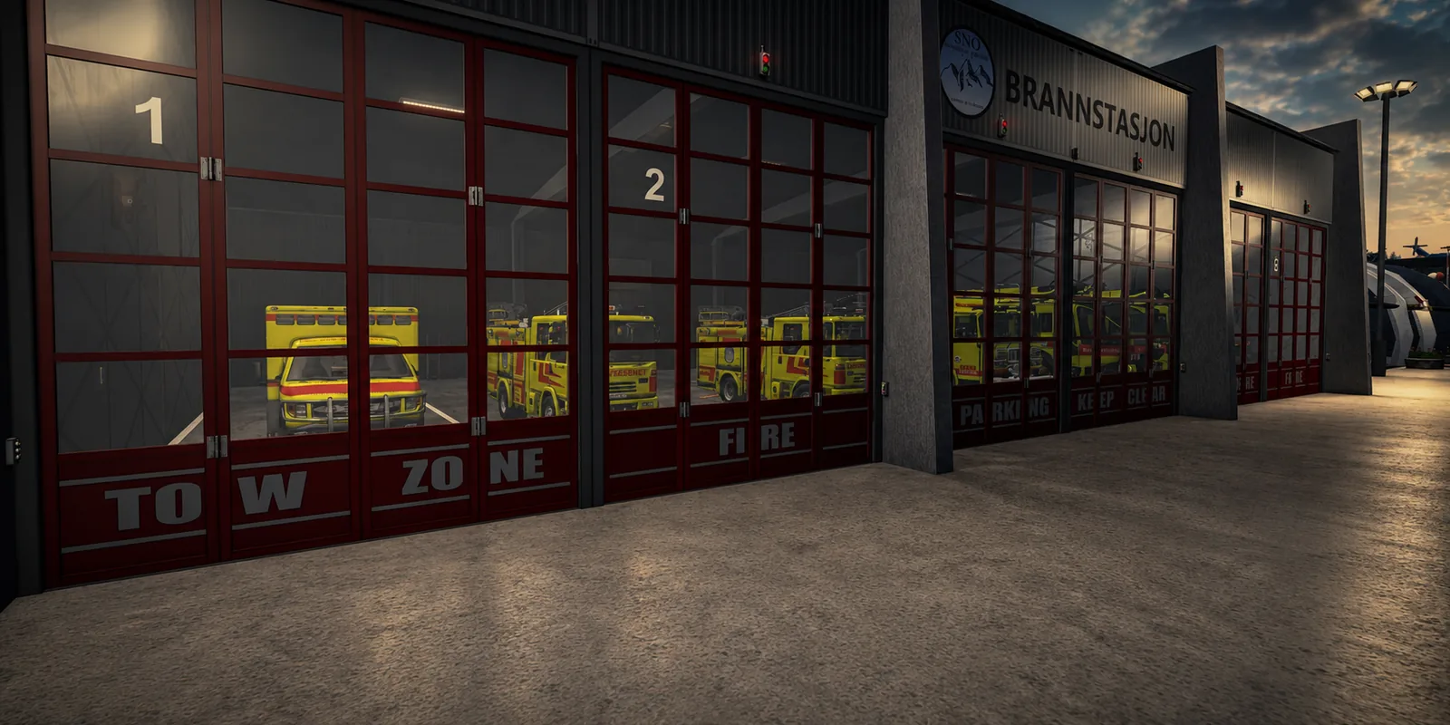 The SNO fire station &mdash; brannstasjon &mdash; six red-doored bays with crash tenders and an ambulance inside
