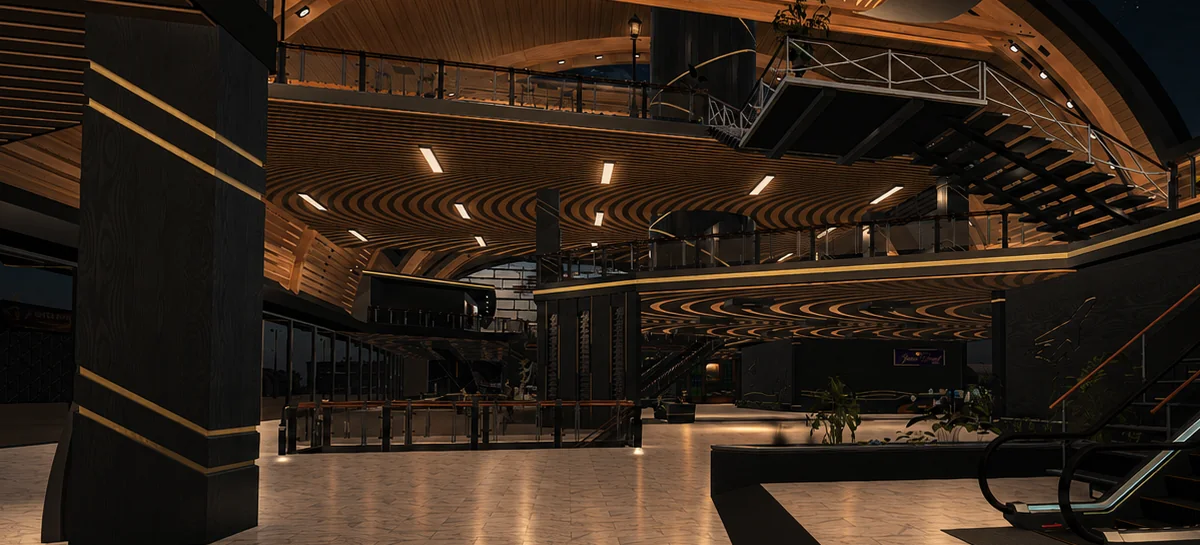 The departures hall at night &mdash; timber roof, balcony and marble floor lit warm